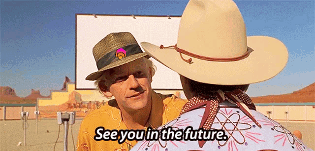 a man wearing a cowboy hat says " see you in the future " to another man