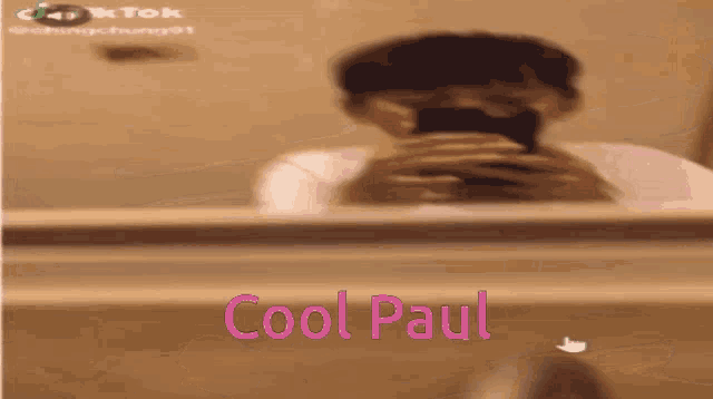a person taking a picture of themselves in a mirror with the words cool paul
