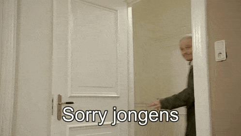 a man stands in front of a door that says sorry jongens on it