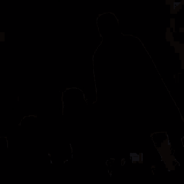 a close up of a cartoon character 's face with a dark background