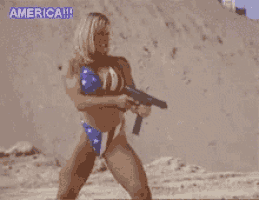 a woman in a bikini is holding a gun and says america fuck yeah !!!