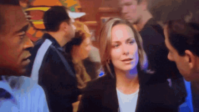 a blurry picture of a woman in a crowd