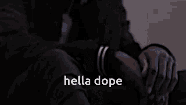 hella dope is written on a dark background