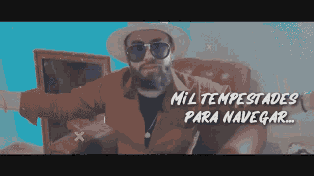 a man wearing sunglasses and a hat says mil tempestades para navegar