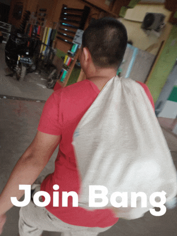 a man in a red shirt is carrying a bag that says join bang on the bottom