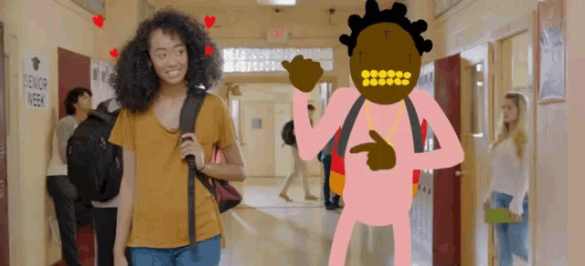 a girl walking down a hallway with a sign that says senior area