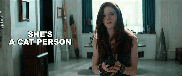 Shes A Cat Person Chloe GIF - Shes A Cat Person Chloe Rose Leslie GIFs
