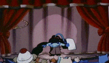 a group of cartoon characters are standing on a stage with red curtains behind them