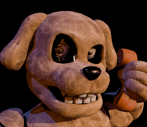 a stuffed dog is holding a telephone in its mouth