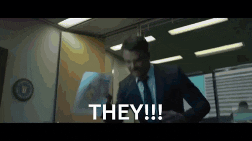 a man in a suit and tie says they