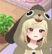 a girl is wearing a dog hooded sweatshirt