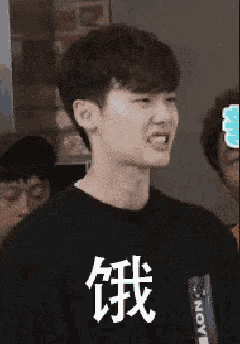 a young man wearing a black shirt that says nov on it