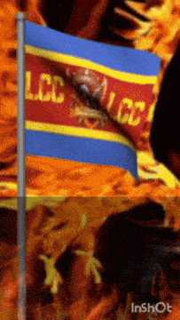 a flag that says lcc on it is waving in the wind
