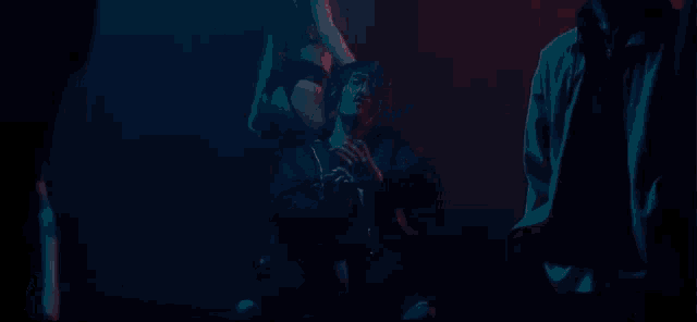 a man is kneeling down with a woman on his shoulders
