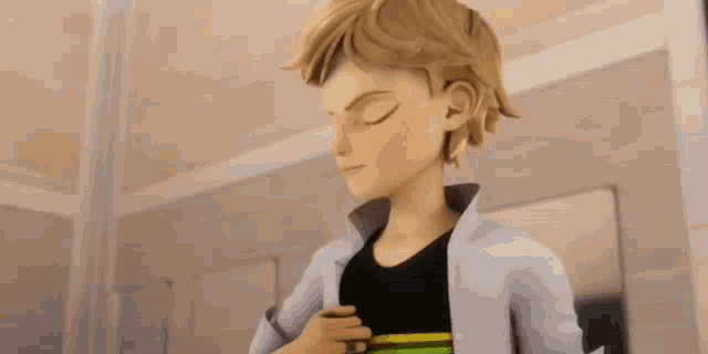 a boy in a white jacket is holding a black object in his hand