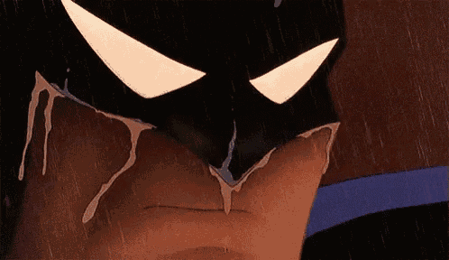 a close up of a cartoon character 's face with tears coming out of it