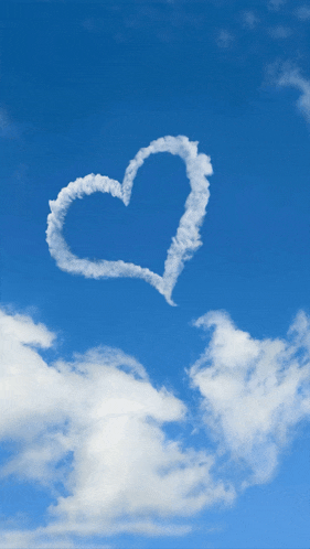 a cloud in the shape of a heart in the sky