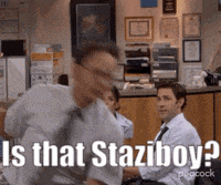 a man in a suit and tie is jumping in the air with the words is that staziboy written below him .