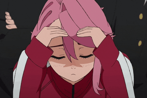 a girl with pink hair is holding her head in pain