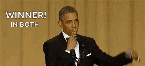 barack obama is holding his hand to his mouth while giving a speech at an event .
