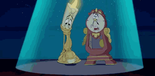 a clock and a lamp from beauty and the beast are standing next to each other on a stage .