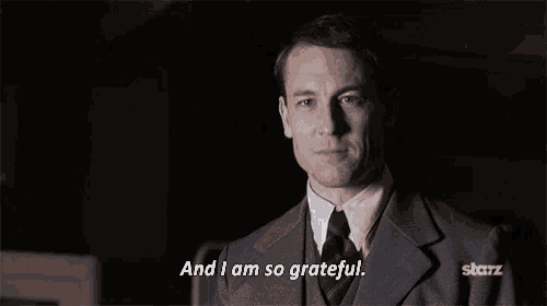 a man in a suit says " and i am so grateful "