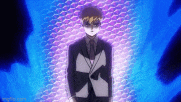 a man in a suit and tie is standing in a dark room .