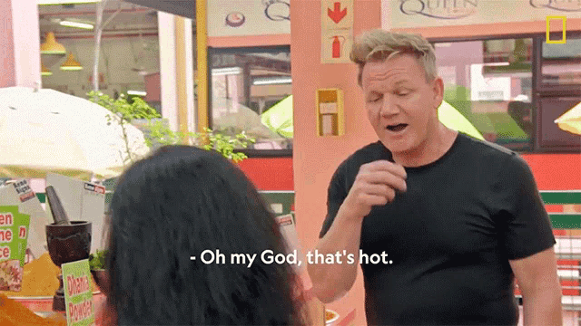 a man says oh my god that 's hot while standing next to a woman