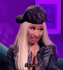 a blonde woman wearing a black hat and a denim jacket says it 's nice