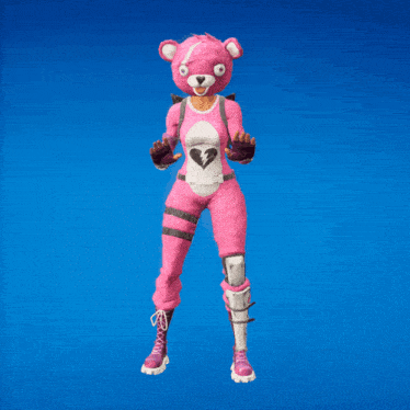 a pink teddy bear with a broken heart on his chest