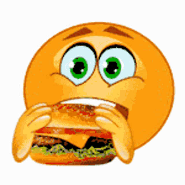a cartoon smiley face is eating a cheeseburger .