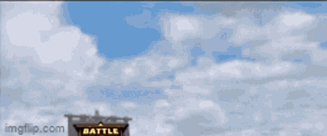 a battle beyond sign against a cloudy blue sky
