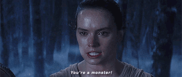 a woman says " you 're a monster " in a dark scene