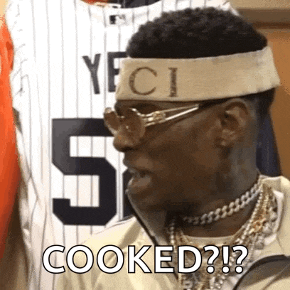 a man wearing a headband and sunglasses is standing in front of a jersey that says cooked ?