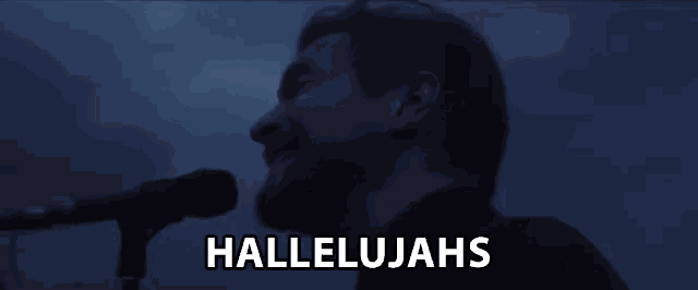 a man singing into a microphone with the words hallelujahs written below him
