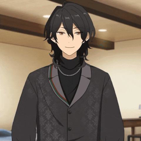 a man with long black hair wearing a black turtleneck and a black jacket