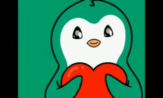 a penguin is holding a heart in its hands .