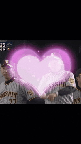 a baseball player with the number 77 on his jersey is standing next to another player