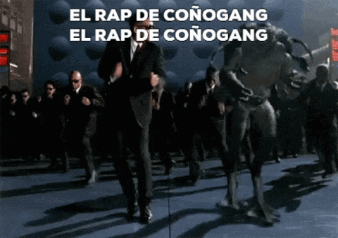 a man in a suit is dancing in front of a crowd with the words el rap de conogang on the bottom