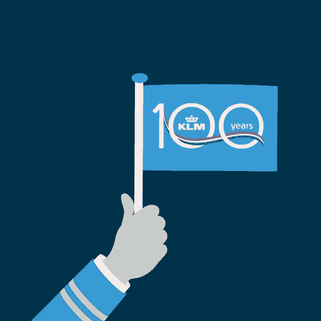 a hand is holding a blue flag that says 100 years klm