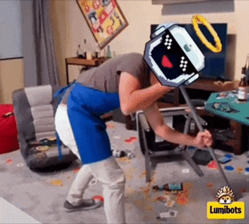 a man in a blue apron is standing in a messy room with a lumibots logo