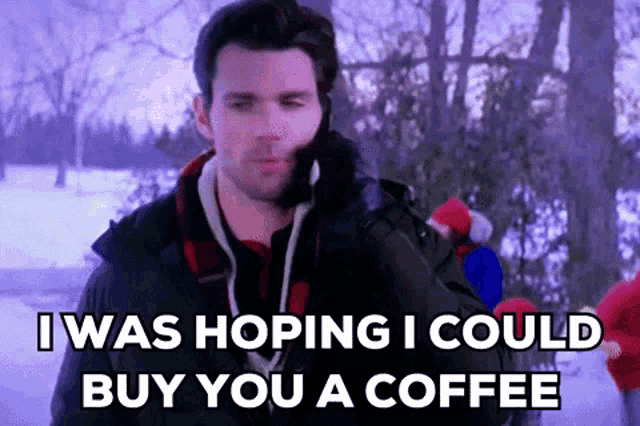 a man is talking on a cell phone in the snow while saying `` i was hoping i could buy you a coffee ''
