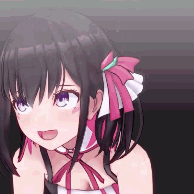 a close up of a girl 's face with a bow in her hair