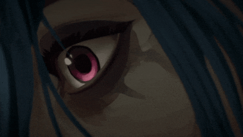 a close up of a woman 's eye with a pink pupil