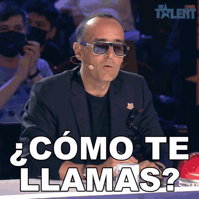 a man wearing sunglasses and a suit says " como te llamas " in spanish