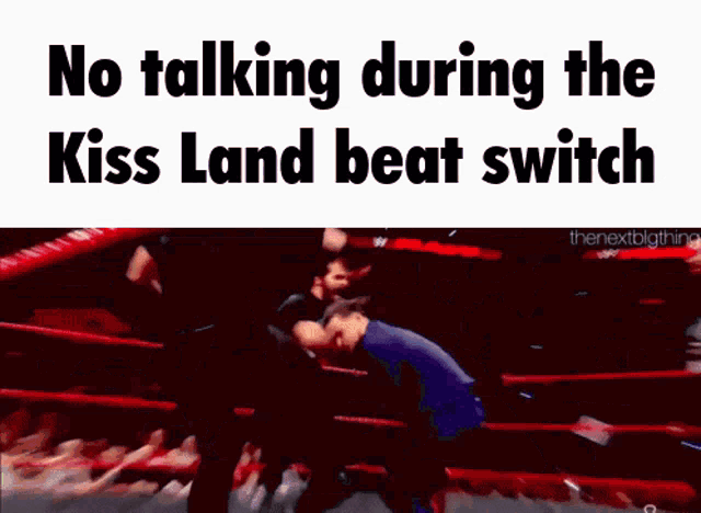 a wrestling match with the words no talking during the kiss land beat switch on the bottom