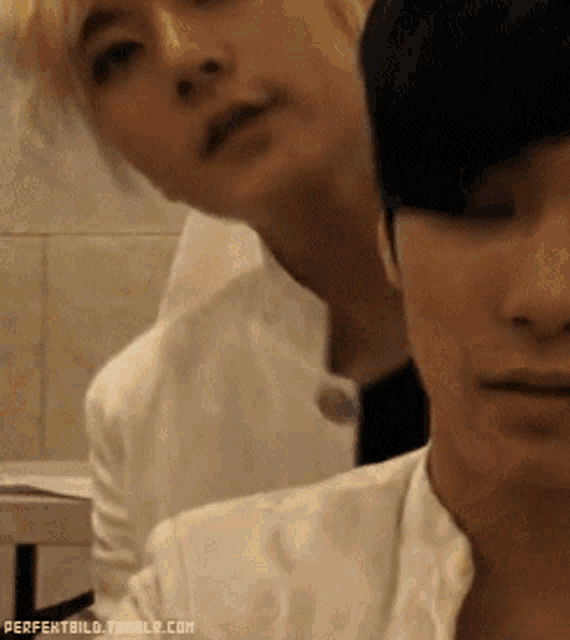 two men are standing next to each other with perfectbild.tumblr.com written on the bottom