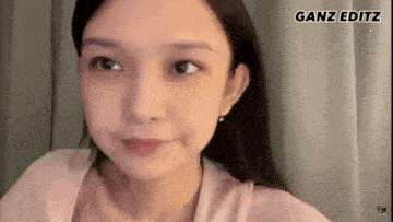 a close up of a woman 's face with the words ganz editz in the corner .