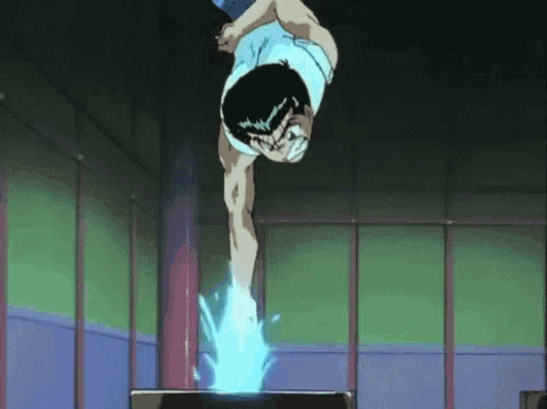 a man is doing a handstand in a room with water coming out of it .