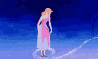 cinderella from disney 's cinderella is standing on a ice rink surrounded by sparkles .